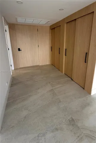 Entrance foyer with closets
