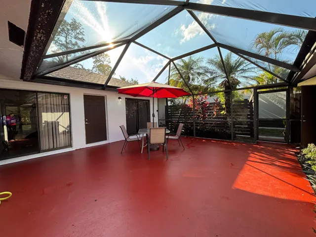 Private entry to the patio from 1-car garage