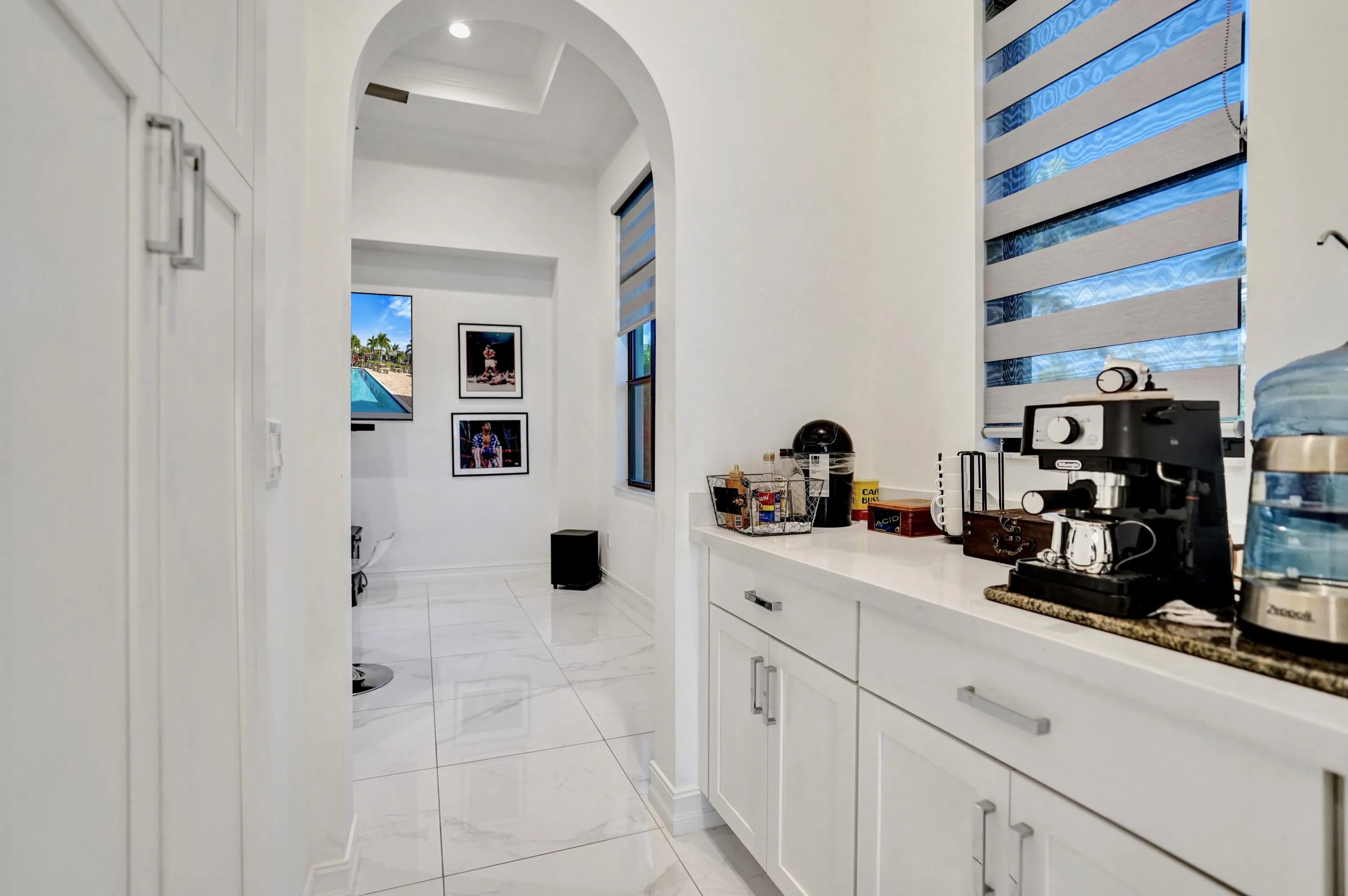 Coffee area with oversized pantry.