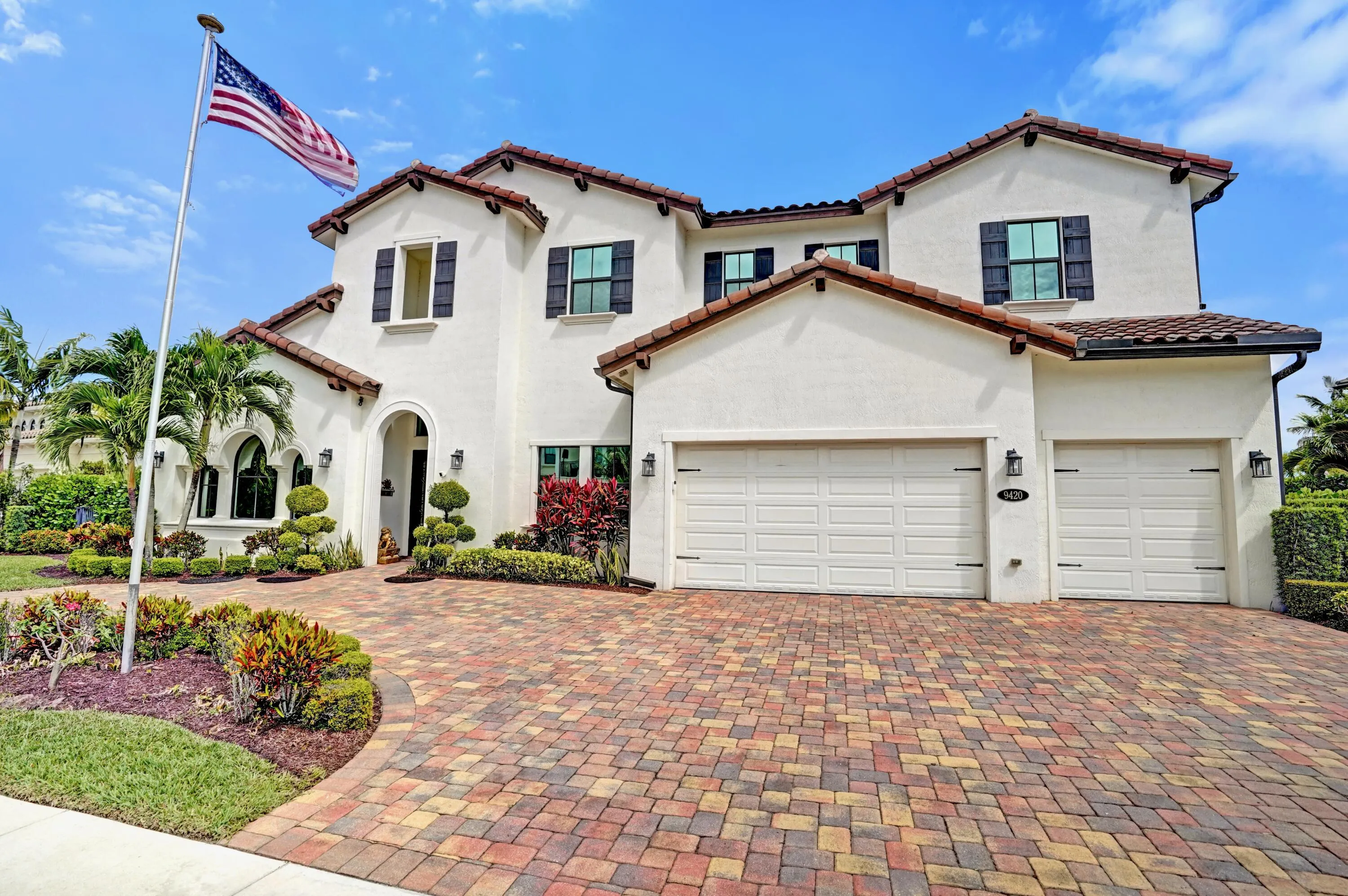 4 car garage (tandem) with a circular driveway!