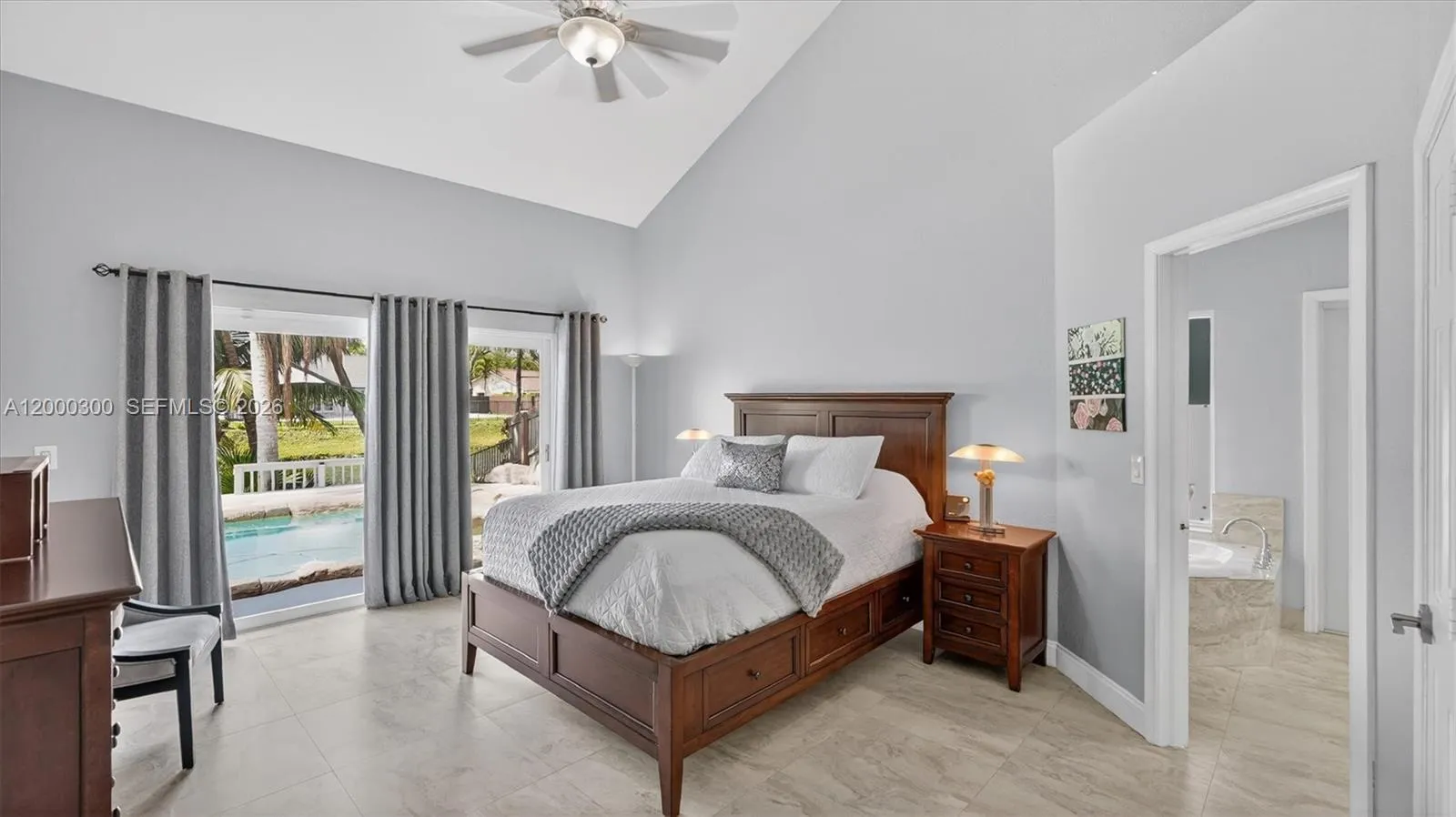 Master down stairs, pool & lake views