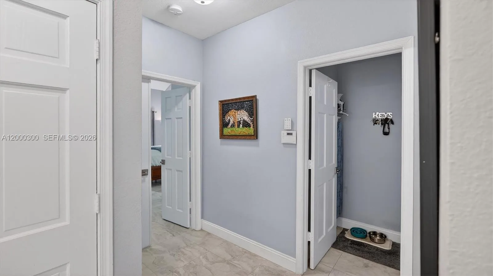 to the master, laundry room, garage & half bath