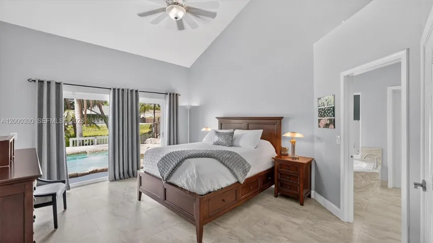 Master down stairs, pool & lake views