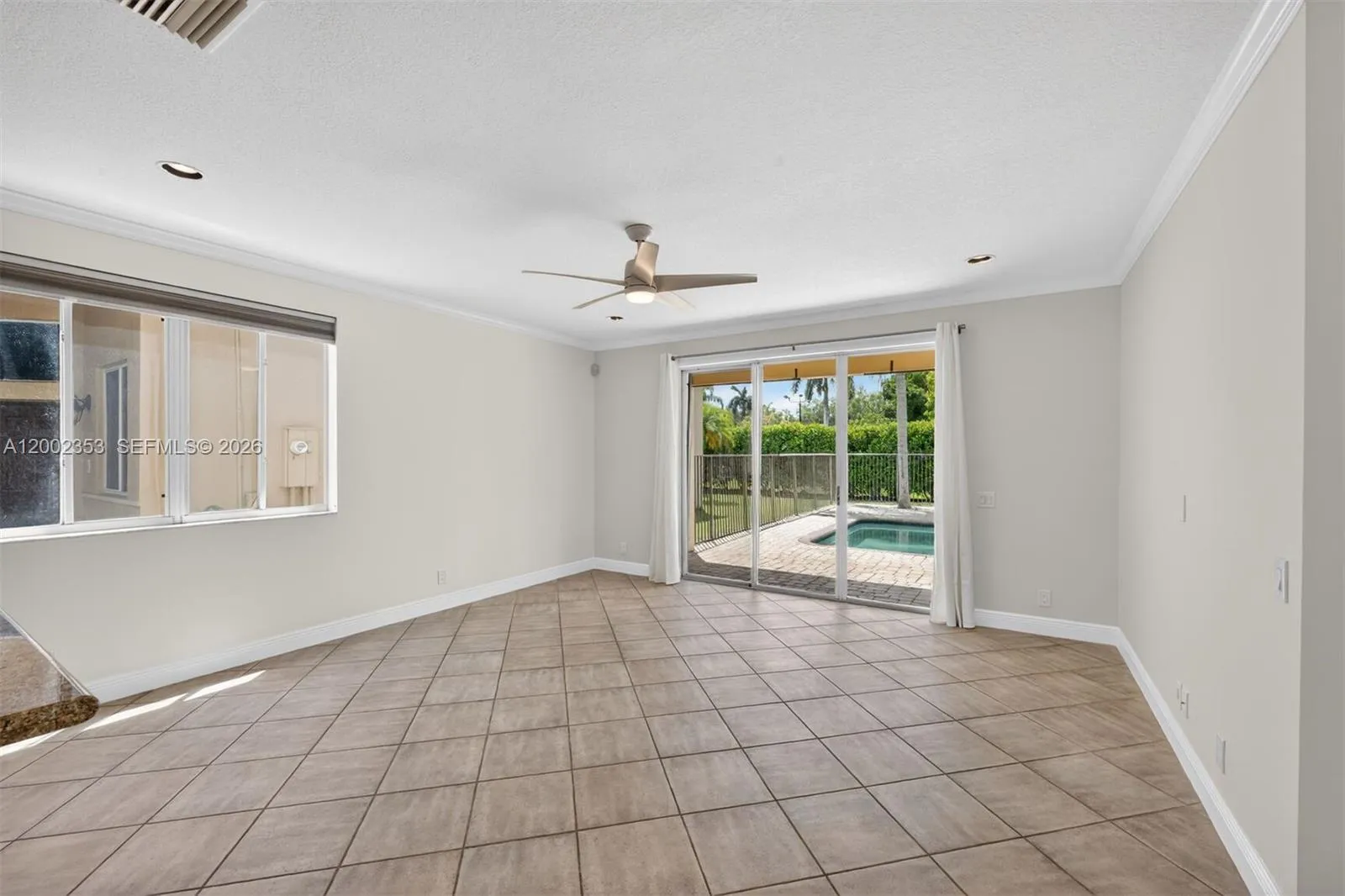 Family room overlooking the pool