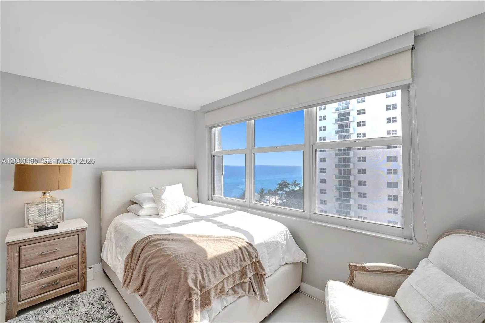 Ensuite-large guest bedroom features ocean view