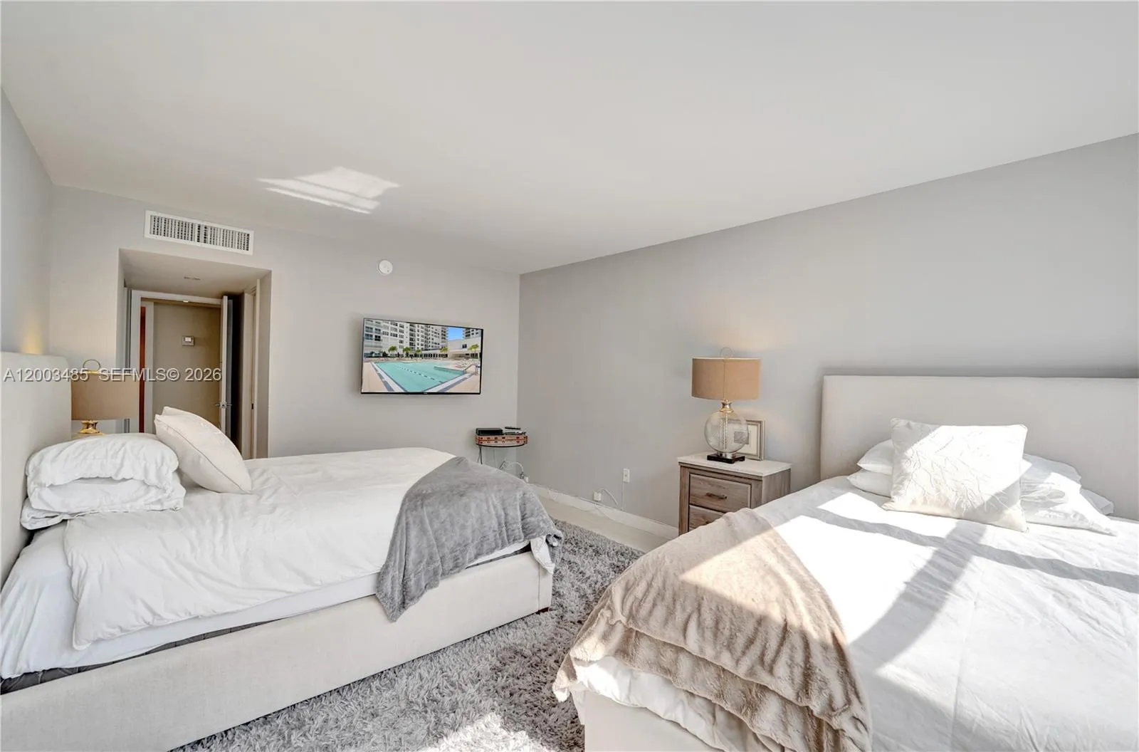 oversized bedroom accommodates 2 beds