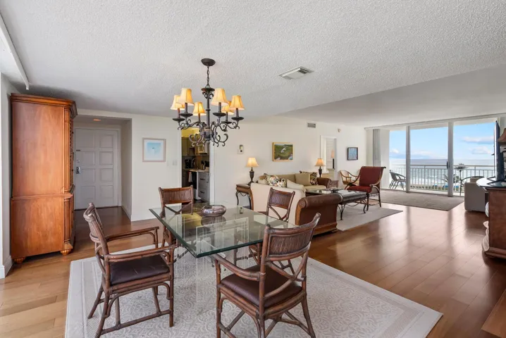 Dining Room--Dine and relax with stunning views that fill the home with light and coastal charm!