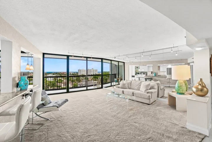 FLOOR TO CEILING SLIDING IMPACT GLASS WALLS