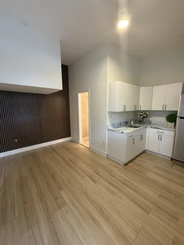 Upgraded space designed for comfortable living, offering room to easily accommodate a large bed, dining table, TV, and even a dedicated desk—ideal for both relaxing and working from home.