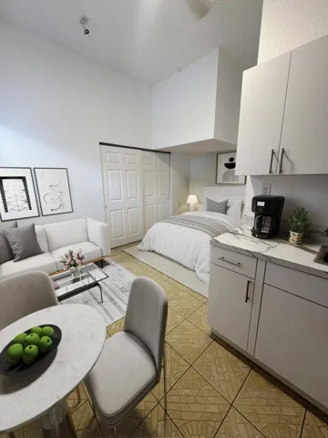 This photo reflects a previous setup and helps showcase the versatility of the space and the possibilities for layout and design.