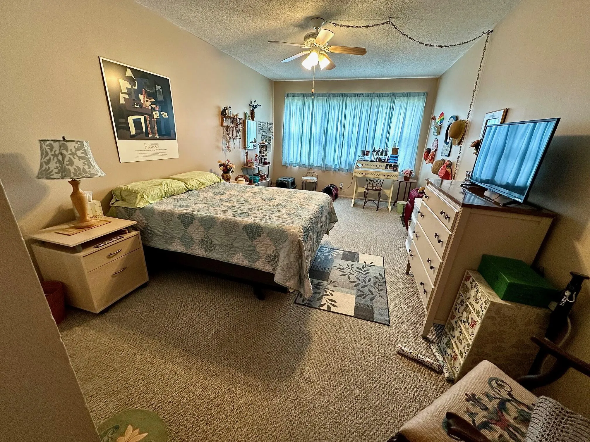 Primary bedroom with lake view out the window