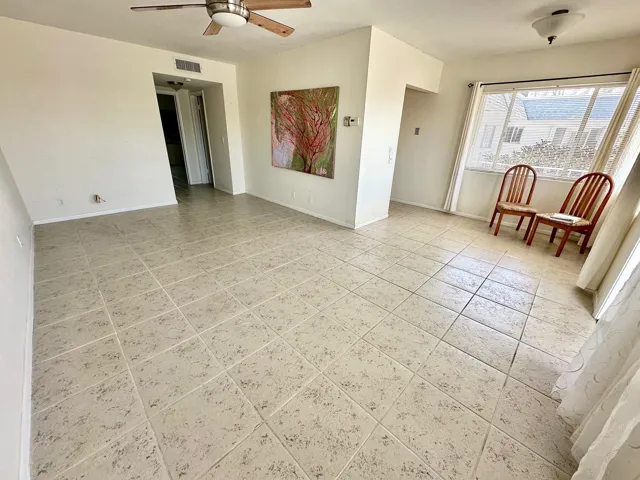 Tlle flooring throughout the apartment