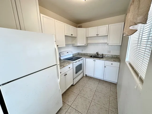 The kitchen has a window