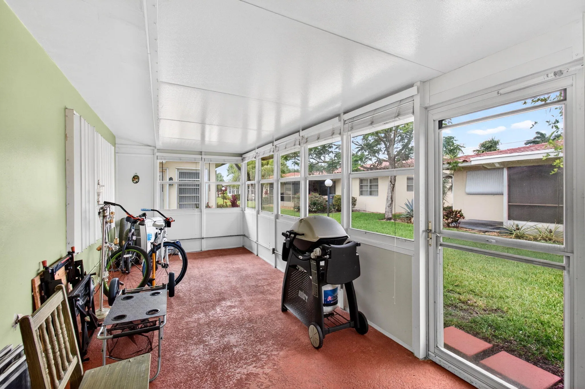 Florida Room/porch - enclosed with windows (not impact rated)