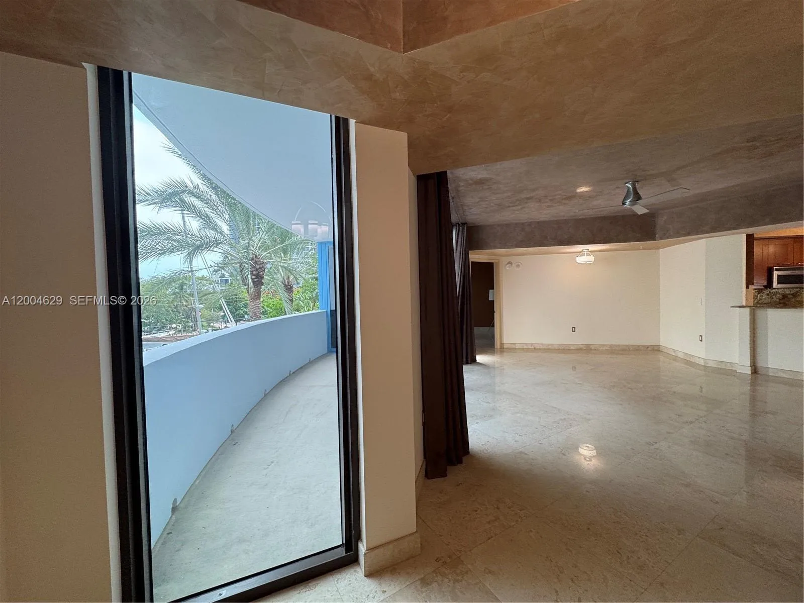 Foyer looking onto terrace and living room