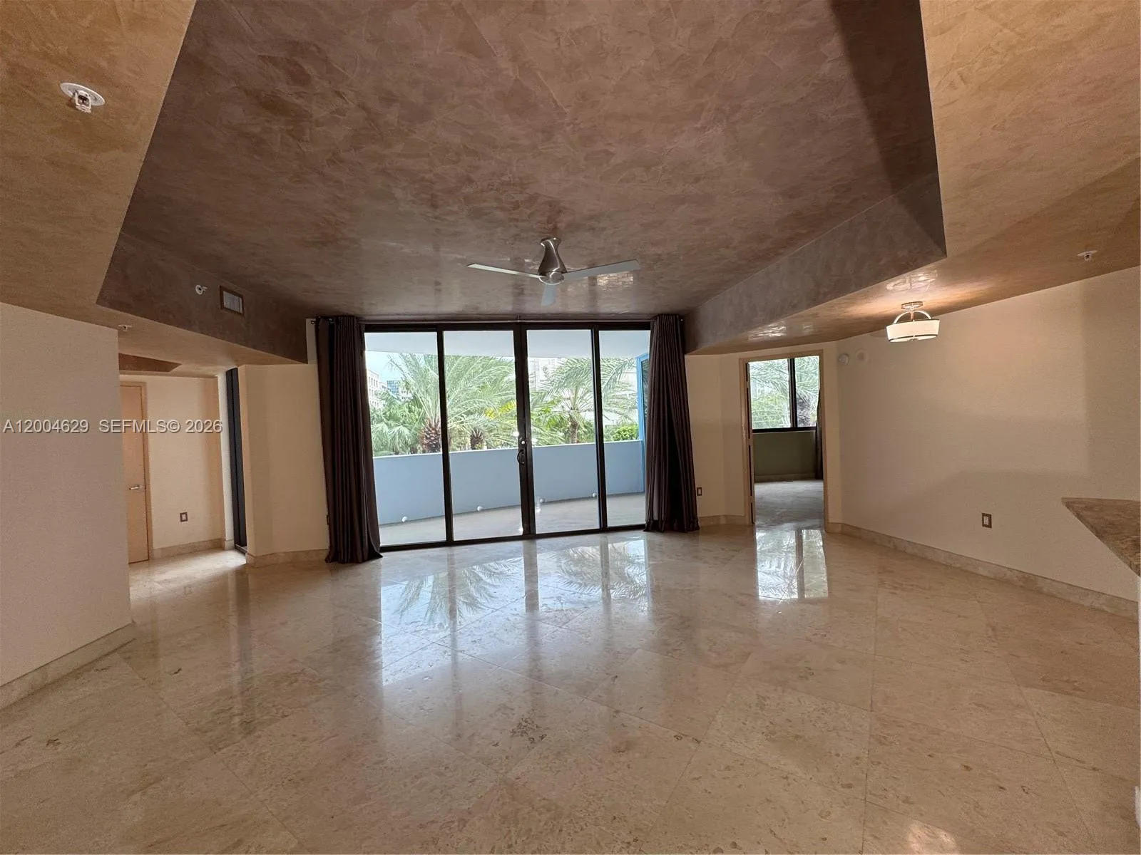 View from Kitchen onto living and terrace