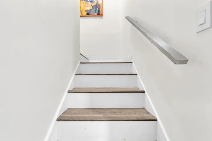 Stairs Leading to the 2 Primary Suites
