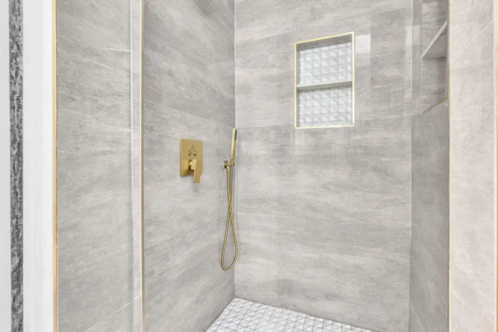 Primary Bathroom #1 with Floor to Ceiling Tile