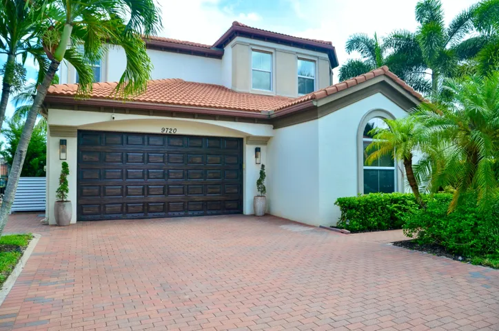 Front with expanded driveway