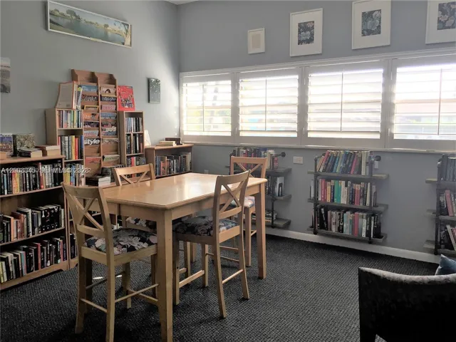 LIBRARY LOCATED IN COMMUNITY ROOM FOR SHARING BOOKS