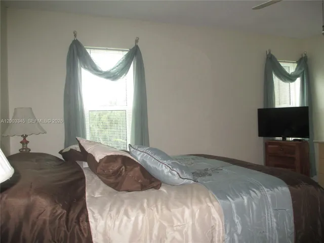MASTER BEDROOM WITH TWO WINDOWS FOR MORNING LIGHT