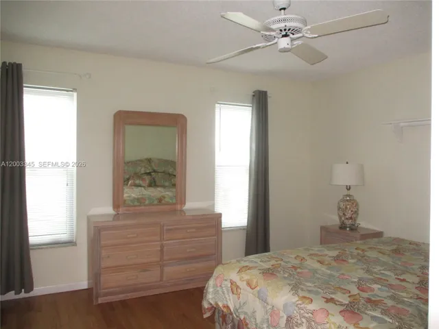 GUEST BEDROOM WITH TWO WINDOWS FOR SUN LIGHT
