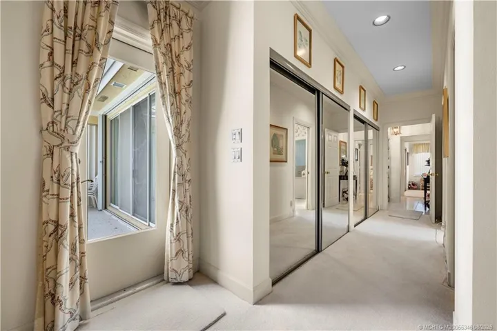 Extensive closet space and private entrance to pool lanai.
