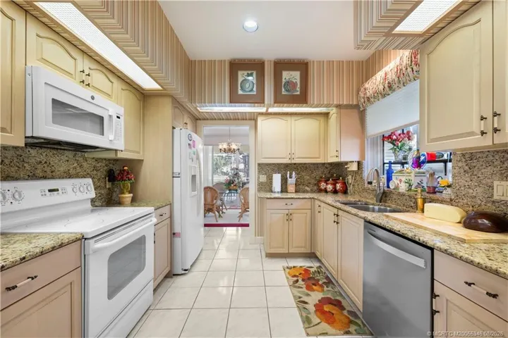 Large window by the sink for extra natural light.