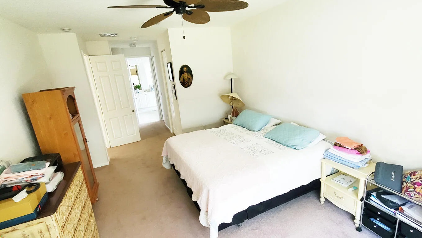 Walk in closet on your way to the Master Bath