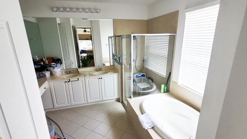 Dual sinks and a soaker tub to relax in after a rough day.