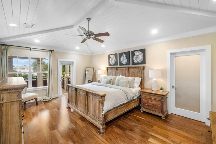 Primary bedroom with oversized balcony and ocean views.