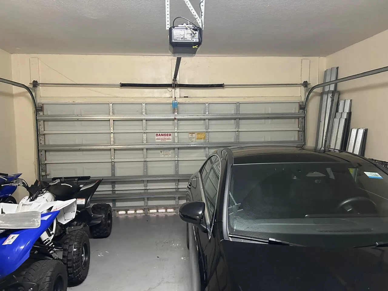 TWO CAR GARAGE WITH GARAGE DOOR OPENER
