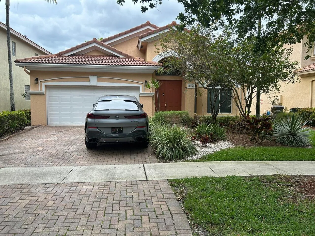 TWO CAR GARAGE WITH DOUBLE DRIVEWAY