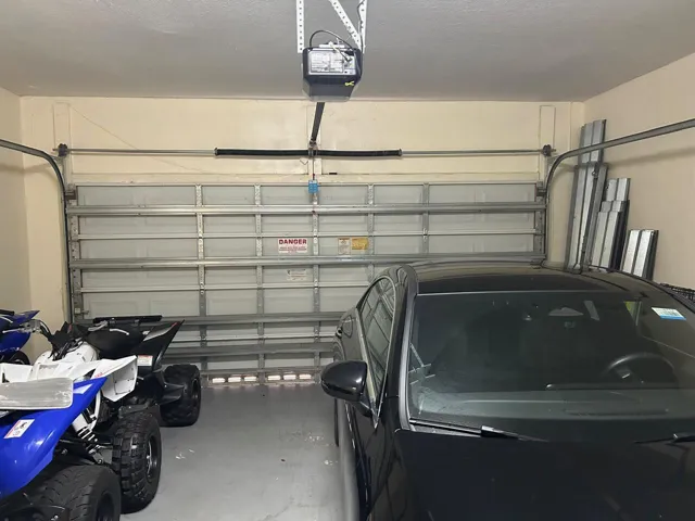 TWO CAR GARAGE WITH GARAGE DOOR OPENER