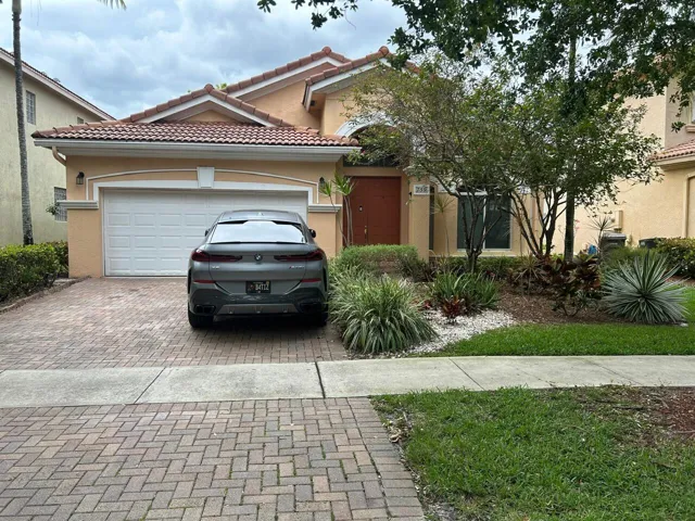 TWO CAR GARAGE WITH DOUBLE DRIVEWAY
