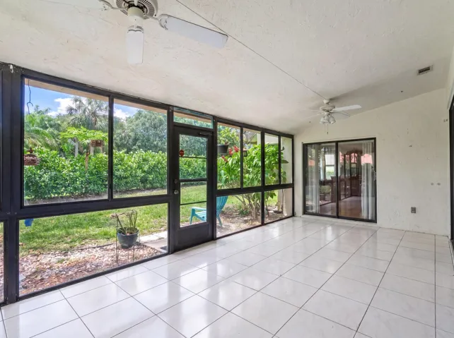 Enclosed Patio looking into Private Backyard