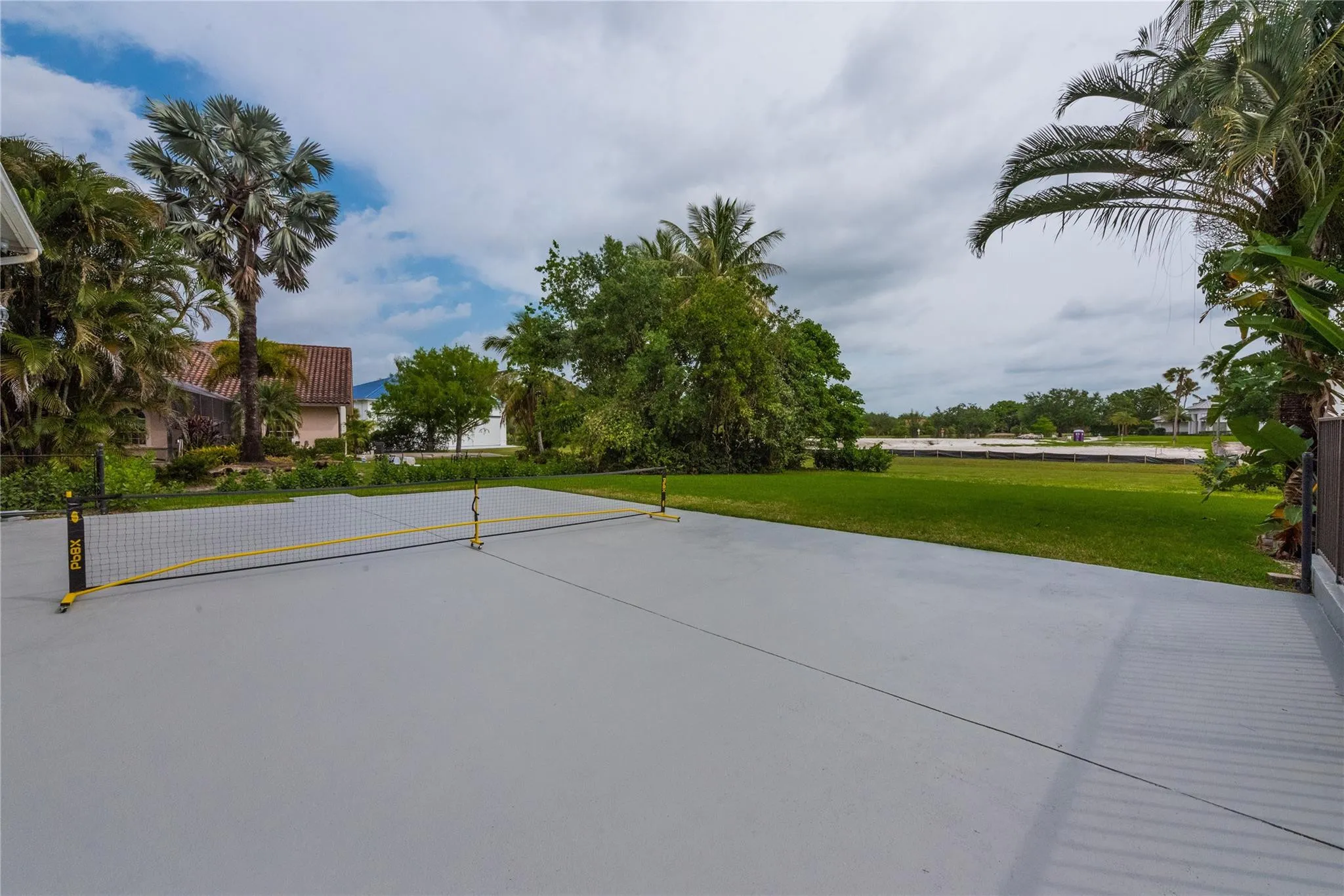 Hangar Pad surrounded by new construction homes