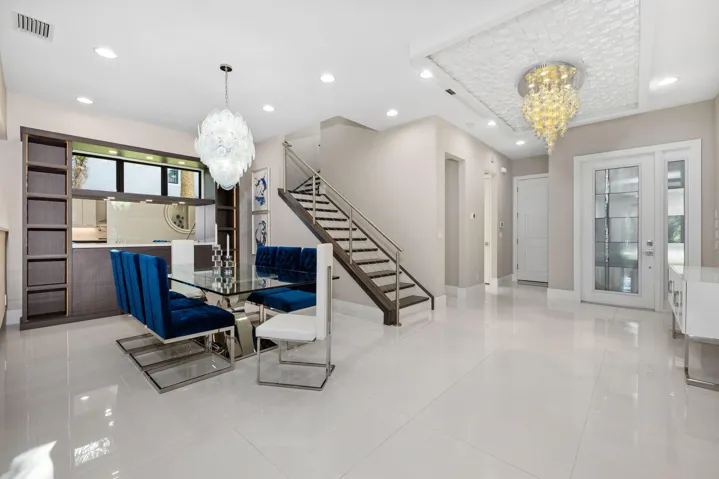 Enjoy entertaining guest in this dining room with built in wine wall