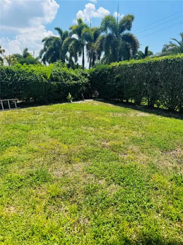 Expansive backyard with plenty of space for entertaining, gardening, or recreating tour dream outdoor retreat.