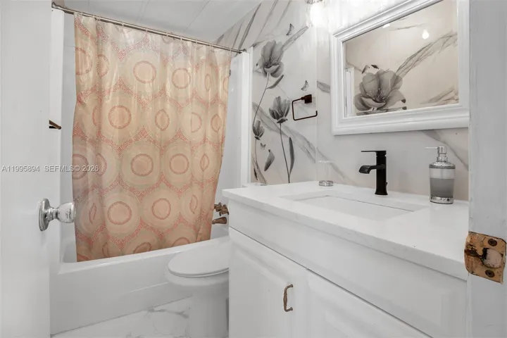 Spacious and inviting primary bedroom.