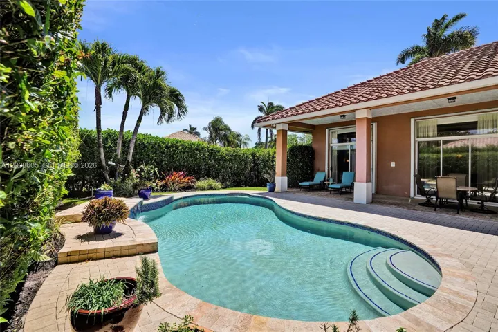PRIVACY IN THE BACK YARD POOL AREA WITH FENCE ALL AROUND THE PROPERTY