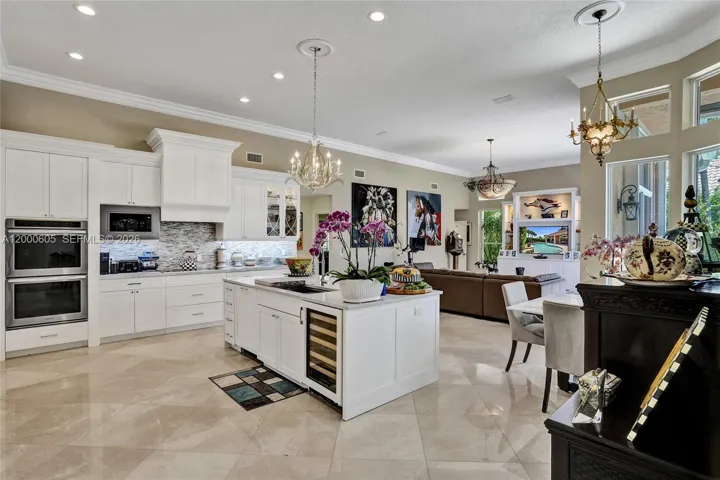 DOUBLE OVEN, BRAND NEW MICROWAVE, WINE COOLER IN WHITE MODERN OPEN KITCHEN