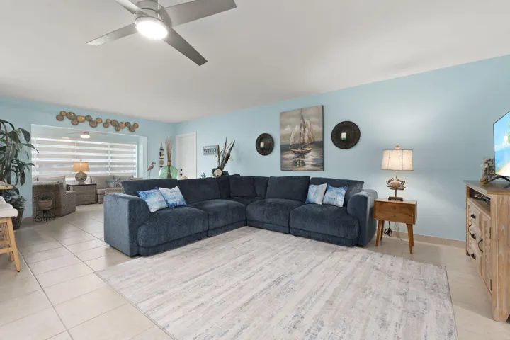FACING FRONT DOOR & SITTING ROOM