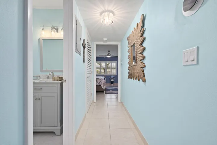 TO HALF BATH AND OWNERS SUITE