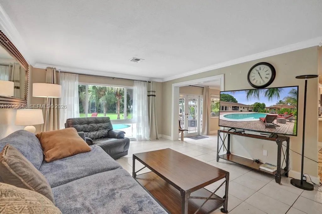 Picture window to the pool and backyard