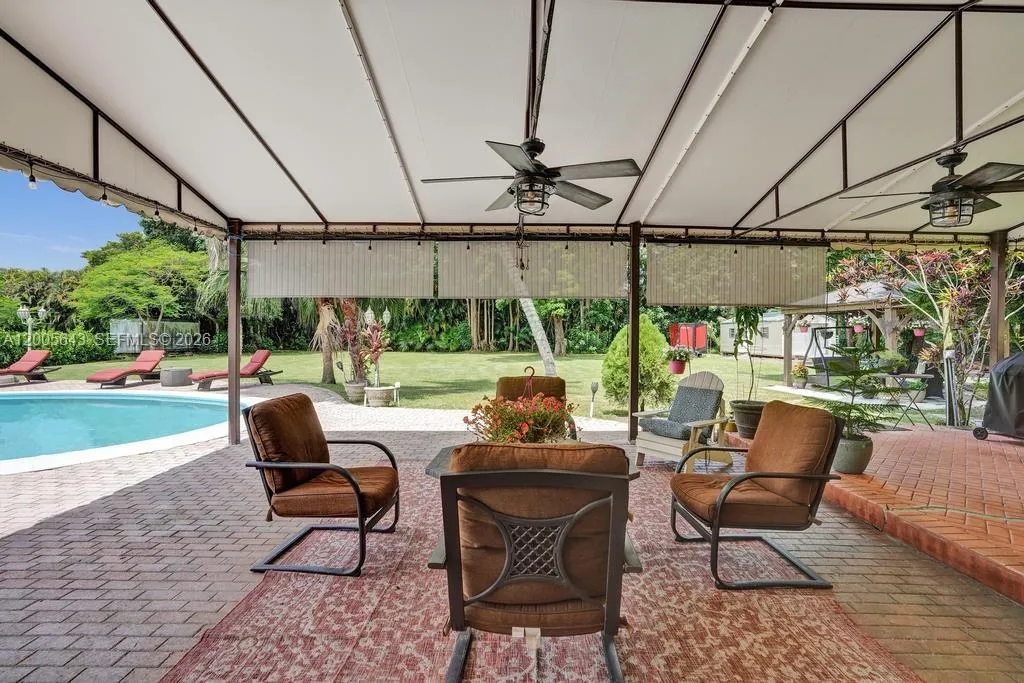 Ceiling fans, lighting, misters and set up for exterior speakers