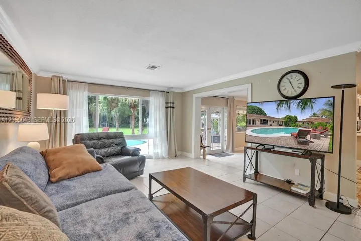 Picture window to the pool and backyard