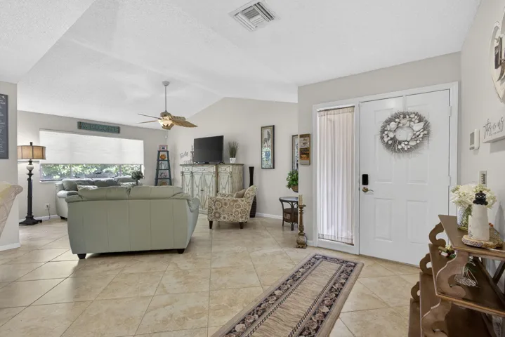 entrance open area to living area. Tile throughout