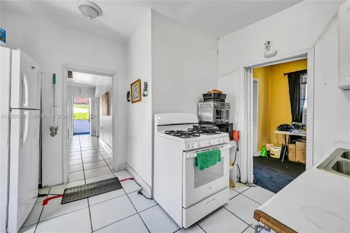 kitchen with access to a bonus room