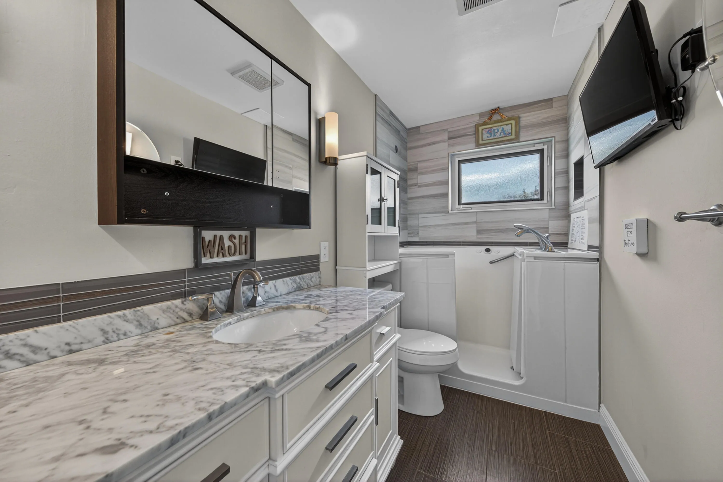 Kohler Walk-In Tub with wall mounted TV (Bathroom #2)